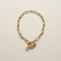 Travertine T-Bar Bracelet laid flat to show its polished links and toggle fastening