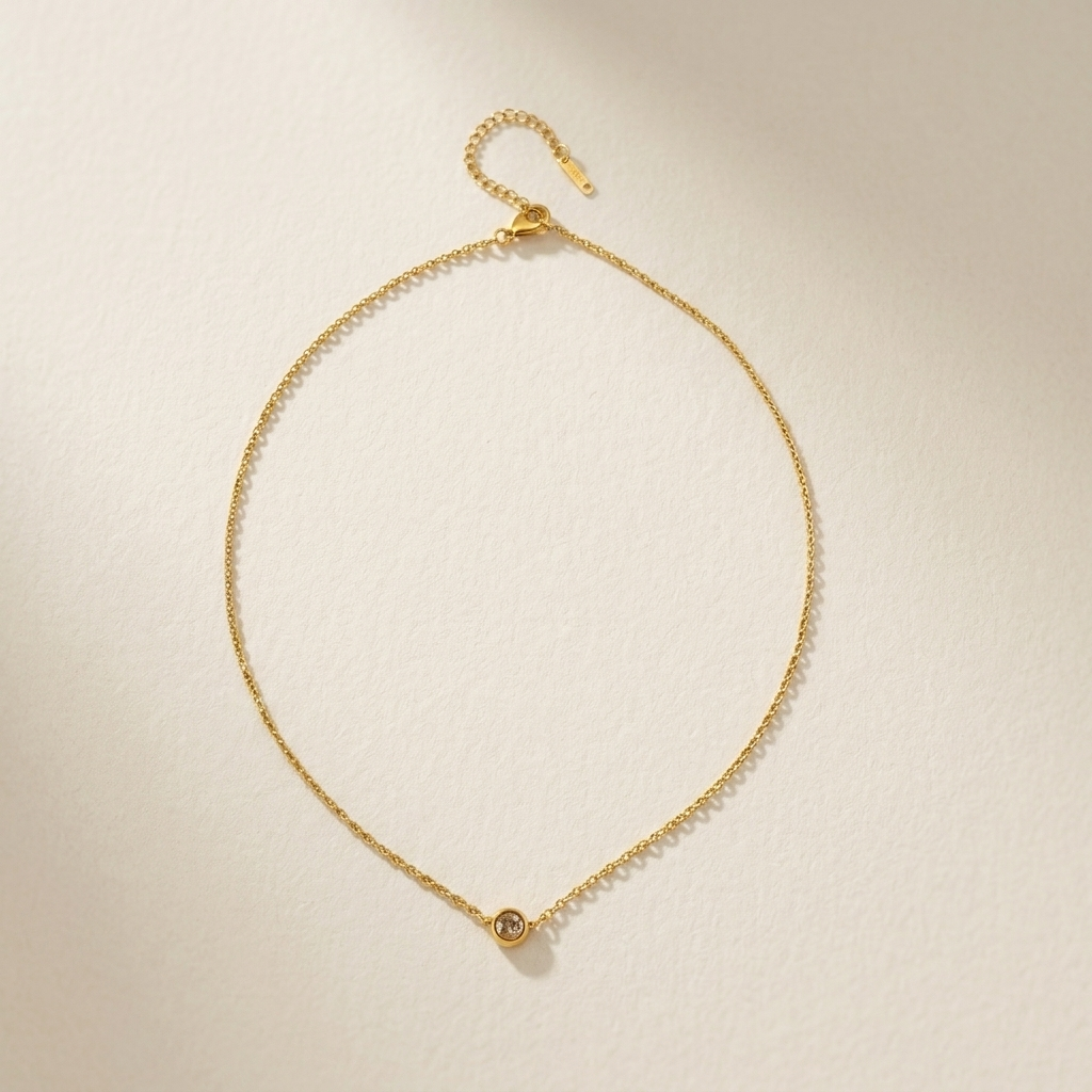 Morning Light Solitaire Necklace laid flat to show the fine chain and crystal pendant