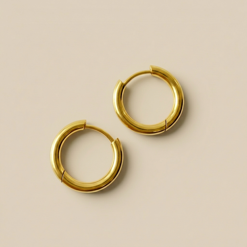 Pair of Little Joy Huggie Hoops in polished 18ct gold plate