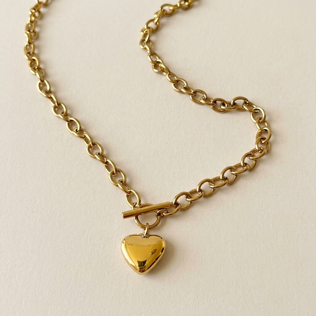 Joyful Heart Necklace with polished link chain, front T-bar clasp and gold heart pendant